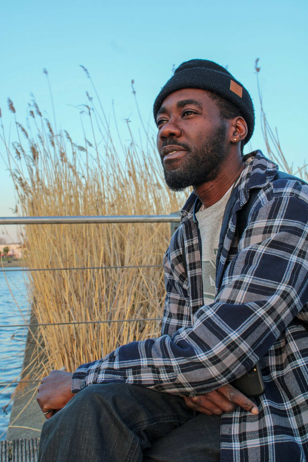 Portrait of a bearded Black man in a casual shirt
